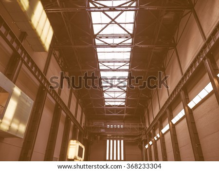 LONDON, UK - SEPTEMBER 28, 2015: The Turbine Hall once a power station is now a huge open public space part of Tate Modern art gallery in South Bank vintage