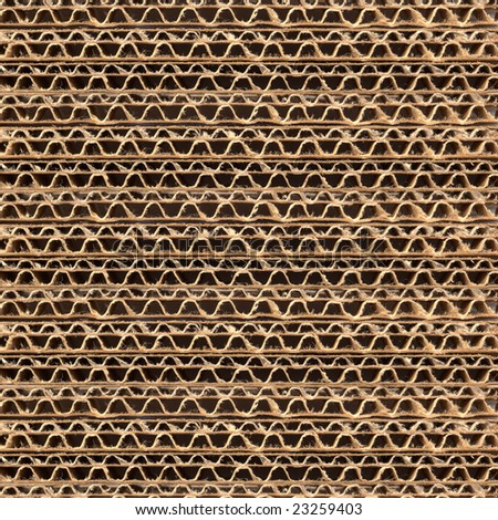 Sheet of brown corrugated cardboard material background