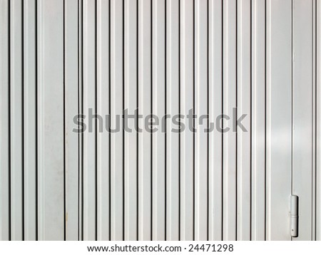 Detail of industrial steel metal door background