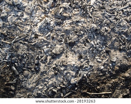 Black ashes or charcoal useful as a background