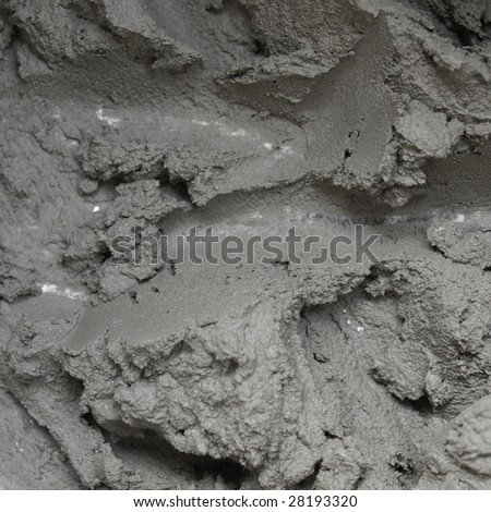 Detail of liquid concrete formed by mixed cement, water and sand
