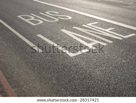 Bus lane traffic signs on a street