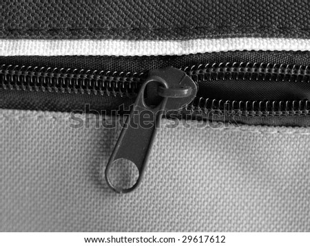 Zipper or zip fastener joining two edges of fabric