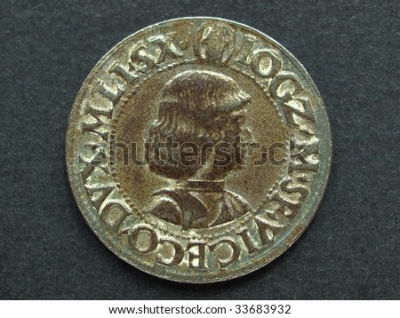 Ancient Roman coin on a black background