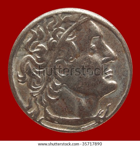 Ancient Roman coin isolated over red background