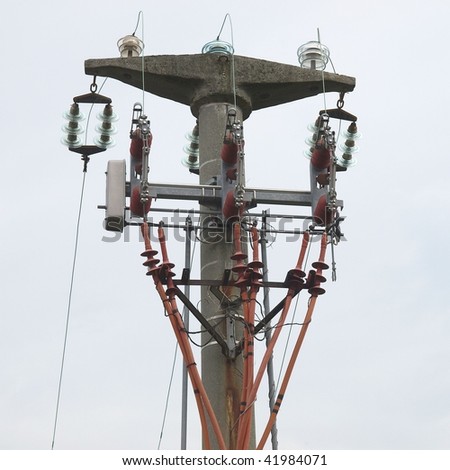 Electric transmission line tower mast with wires