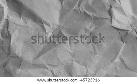 Sheet of brown and rippled paper background - (16:9 black and white)