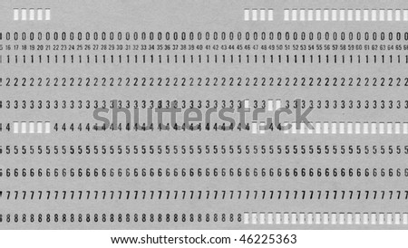 Vintage punched card for computer data storage isolated over white - (16:9 black and white)
