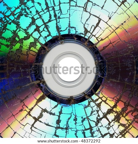 Damaged cd media showing the concept of data loss and disaster recovery backup