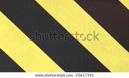 Reflective yellow and black stripes on a traffic sign (16:9 aspect ratio)