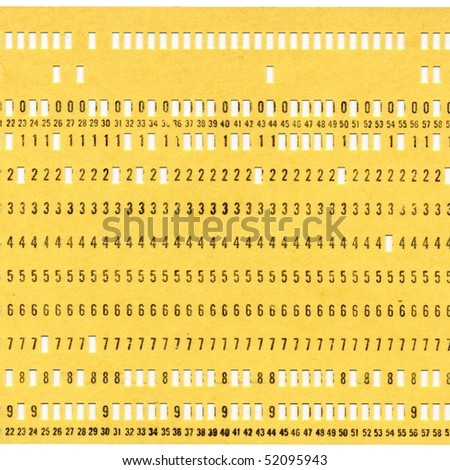 Vintage punched card for computer data storage isolated over white