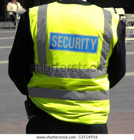 A detail of a security staff member