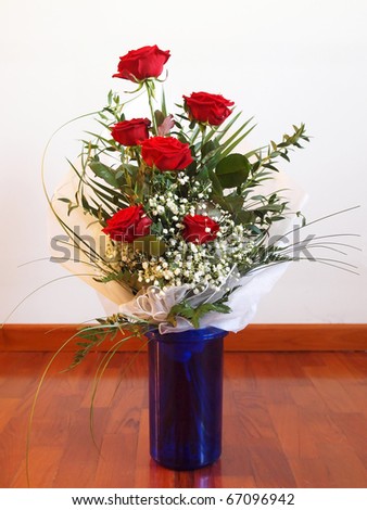 A bouquet of red roses - perennial flower shrub vine of genus Rosa Rosaceae