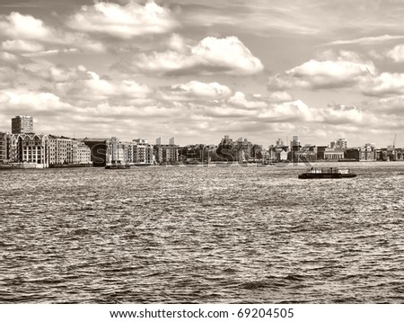 Docks in London Docklands on River Thames, UK - high dynamic range HDR - black and white