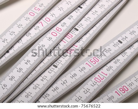 Wooden carpenter ruler for measurements in building site