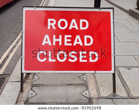 A traffic or a construction site sign - Road ahead closed