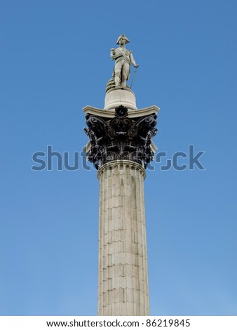 Nelson Column monument in Trafalgar Square London UK
