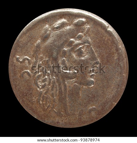 Ancient Roman coin isolated over black background