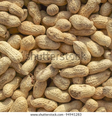 Dry roasted peanuts food background
