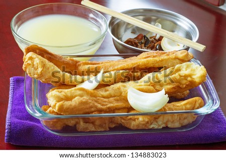 deep-fried dough sticks and millet gruel, China\'s traditional breakfast.