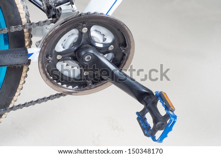 Bike close up on gear wheel, pedal and wheel
