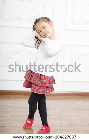 A picture of a little ballerina dancing over