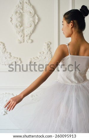 Beautiful ballerina dress rehearsal, elegant back posture