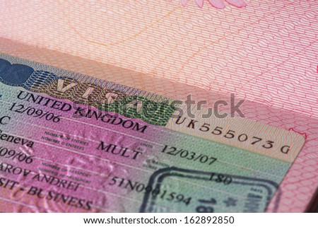 UK visa in passport, closeup