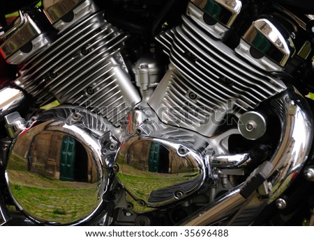 Close up of a twin cylinder motorcycle engine.