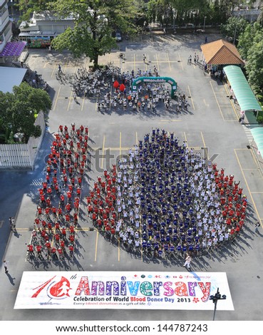 BANGKOK , THAILAND -  JUNE 16:  The Celebration of World Blood Donor Day  2013 ,  The Cyclists more 400 persons join Campaign Blood Donor  in Nation Blood Center  Henri Dunant Road , on June 16, 2013.