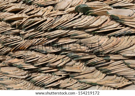 Temple roof tiles, Tiles of thailand house,Tile roof temple in Thailand .