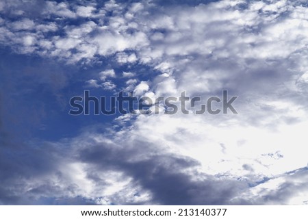 layers of grey clouds in summer afternoon sky