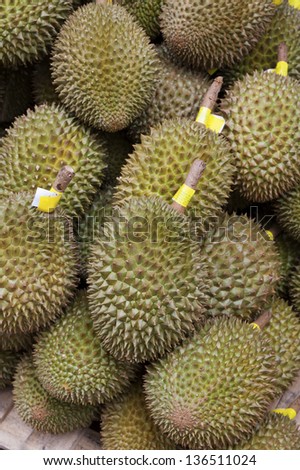 Pile of durian sale in local market. Regarded by many people in southeast Asia as the \