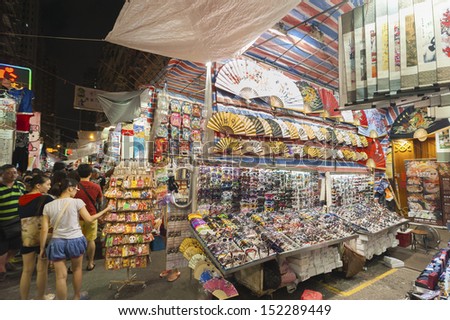 HONG KONG , CHINA - AUG. 17 : Flea market on Aug 17, 2013 in Hong kong. The flea market in Mongkok District is the most famous flea market in Hong Kong and attract many tourists.