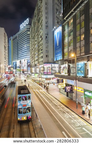 HONG KONG - MAY 29, 2015: People walking through busy streets in Causeway Bay on May 29, 2015 in Hong Kong. With 7M population, it is one of the most dense areas in the world.