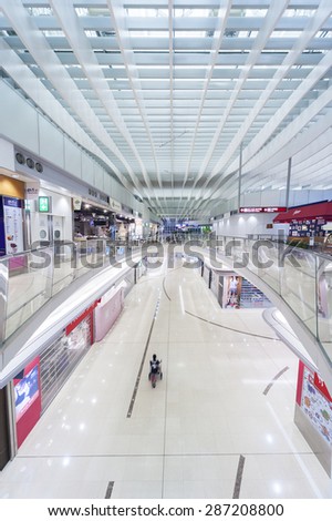 HONG KONG, CHINA - APRIL 16 : Shopping Mall in Hong Kong International Airport on April 16, 2015 in Hong Kong, China. The Hong Kong airport handles more than 70 million passengers per year.