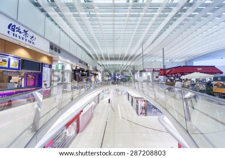 HONG KONG, CHINA - APRIL 16 : Shopping Mall in Hong Kong International Airport on April 16, 2015 in Hong Kong, China. The Hong Kong airport handles more than 70 million passengers per year.