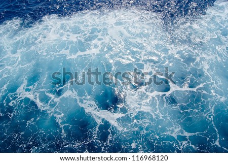 Foamy Mediterranean sea water, shot in the open sea directly from above