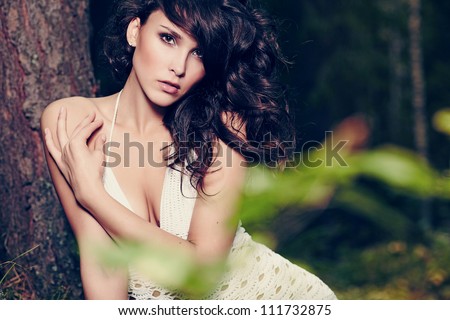 beautiful girl in a wild forest