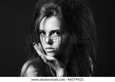 Portrait of a beautiful young woman with dark hair