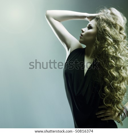 Lifestyle Stock-photo-portrait-of-the-beautiful-woman-with-long-curly-hair-50816374