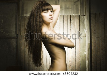 Portrait of the beautiful woman with long hair