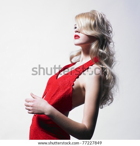 Beautiful woman with elegant dress. Fashion photo