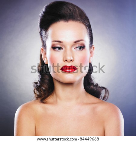 Close-up portrait of sexy caucasian young woman with retro hairstyle, beautiful eyes and sensual lips
