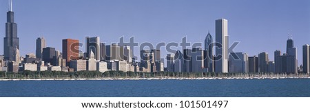 This is the complete Chicago skyline with the Chicago Harbor in the foreground. It is the view in the morning during summer.