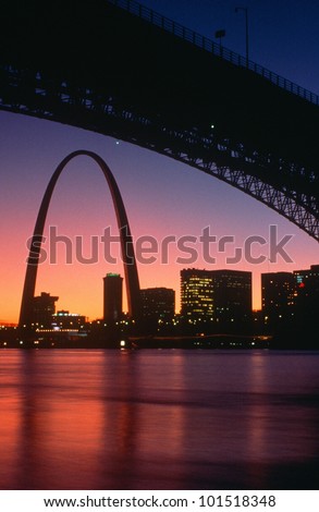 View from under the Eads Bridge of St. Louis Missouri skyline and archway at night
