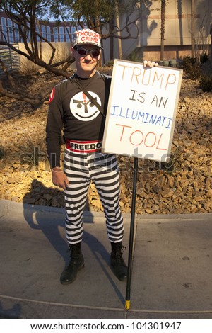 LAS VEGAS - FEB 2: A protestor holds a sign which reads \