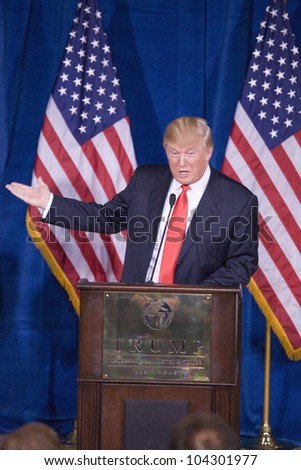 LAS VEGAS - FEB 2: Donald Trump gestures as he speaks at his Hotel on February 2, 2012 in Las Vegas, Nevada. Trump is endorsing Mitt Romney (off camera) for president.
