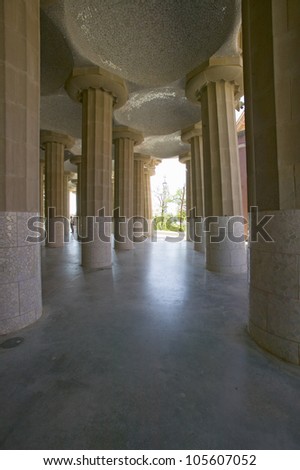 Columns supporting tiled ceiling of Antoni Gaudi\'s Parc Guell, Barcelona, Spain
