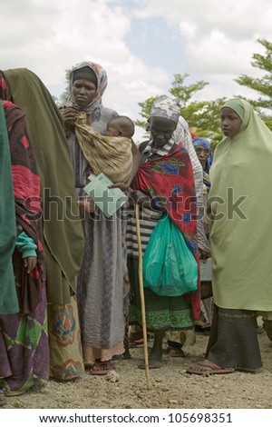 JANUARY 2007 - Kenyan women stand in line to get health checkup for HIV/AIDS at the Pepo La Tumaini Jangwani, HIV/AIDS Community Rehabilitation Program, Orphanage & Clinic. Nairobi, Kenya, Africa